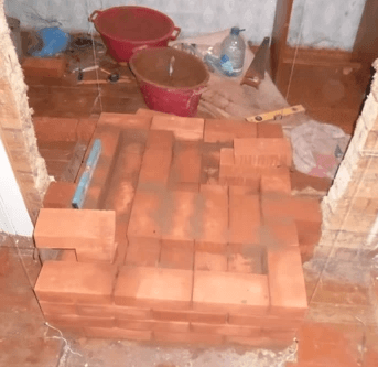 Печь на дровах для дома из кирпича: инструкция, порядовка + фото